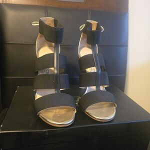 Jimmy Choo Black and Gold Strap Heels
